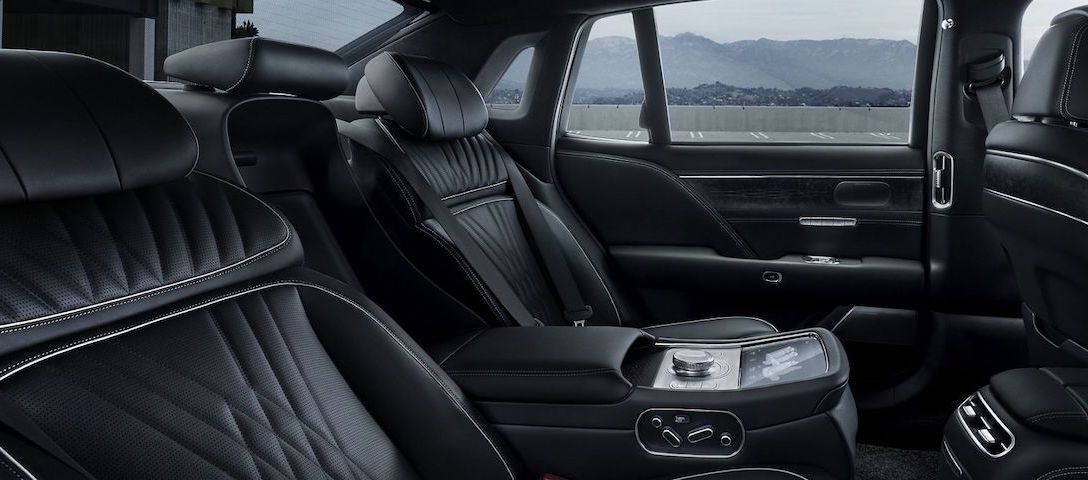 The 2026 Genesis G90 is a full-size luxury sedan with standard AWD, up to 409 horsepower, and Nappa leather across all trims.