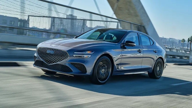 The 2026 Genesis G70 is a luxury sport sedan available with either a turbocharged four-cylinder or twin-turbo V6 engine.